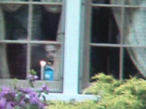 Lu Ann Sicuro has lived in her Ravenna home for 20 years. She says she&rsquo;s experienced some strange and frightening paranormal activity. She hears voices, noises in the closets and door knobs jiggling in her northeast Ohio home. She claims the proof is in a photo taken by her son a few years ago. It shows a little girl&rsquo;s image in the window. 