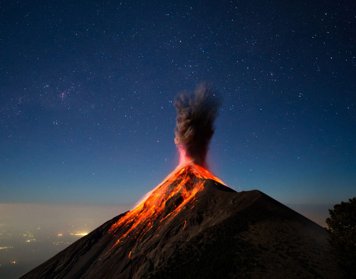 “At around 1:30 a.m., we awoke to the sound of a breath-stealing explosion, I scrambled to the camera just in time to capture a moonlit and lava-covered Fuego as it put on this beautiful display of activity and power.” - Volcán de Fuego, Guatemala; Photo by Andrew Shepard
