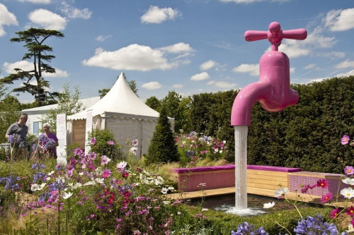 Floating faucet sculpture in Ypres, Belgium. The floating tap fountain is a clever illusion. It consist of a faucet mysteriously hovering above a pool or basin with an endless supply of water gushing out of it from seemingly nowhere. The faucet...