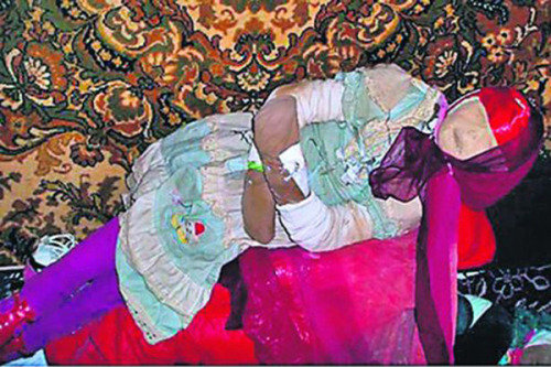 The grave robber who dug up 29 girls and dressed them for birthday partiesCreepy footage filmed by a self-described Russian &ldquo;historian,&rdquo; Anatoly Moskvin, shows several bodies he exhumed after visiting more than 700 cemeteries, sitting around his house in bizarre costumes. Moskvin is rumored to have dug up approximately 150 graves so he could dress the corpses of dozens of young girls for birthday parties. He also compiled up-to-date information about the lives of each girl he had dug up. His macabre obsession with the dead was discovered when his parents visited him after returning from holiday.A reputed genius who speaks 13 languages, the 46-year-old from the city of Nizhni Novgorod in central Russia was arrested in 2011, but he will not stand trial for his appalling crimes. A judge has ruled that he is not mentally fit enough to stand trial and should remain in a psychiatric clinic.A prosecution spokesman said: &ldquo;After three years of monitoring him in a psychiatric clinic it is clear that Moskvin is not mentally fit for trial. He will, therefore, be kept for psychiatric treatment at the clinic.&rdquo;Moskvin claims his fascination with the dead began when he was 12 when he came across a funeral procession whose participants forced him to kiss the face of a dead 11-year-old girl. (Source)