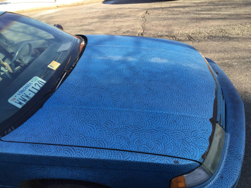 The entire car is covered by a design made simply by sharpie markings!