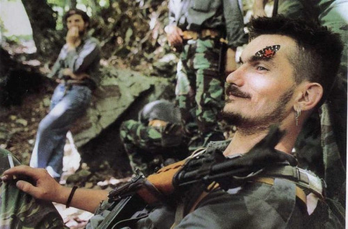 A Butterfly lands on the face of a resting Bosnian Serb soldier, near the Eastern Herzegovinia town of Konjic, 1995 (Source)For more posts, see Sixpenceee