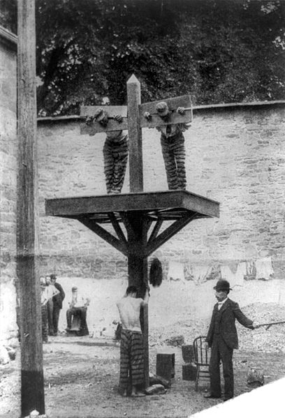 PilloryThe pillory has been in use for hundreds of years, and was traditionally placed in a public square for public humiliation. It was generally used for more serious crimes than the stocks, and more dangerous crimes too, as criminals were pelted with everything from rotten food to stones that could cause death. The above image from New Castle County Jail in Delaware shows how this device was also used as a whipping post, a combination of pillory and post, if you will. The pillory continued to be in use at least until 1907 in Delaware, the year in which the photograph above was taken. (Source)
