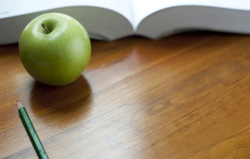 The Terrorizing Of Our Substitute Teacher, Mr. Mahoneyby reddit user Red_GrinWhat an odd guy, I remember thinking as Mr. Mahoney shuffled into my sixth grade classroom for the first time. Crumply brown suit, crooked tie, flush face, right hand nervously shaking at his waist - and somehow, he already had chalk in his hair. He stuttered out his first words to the class, and he hadn’t even finished his introductory sentence before I knew he was a goner. I’d never seen a grown man look so squirrelly. The principal should have adequately warned him - we were a bunch of sharks.And we smelled blood in the water.[[MORE]]The pranks and jokes started small. Mr. Mahoney was asking for it, in a way. He was so unprepared, so utterly clueless - it was impossible not to mess with him. One activity required Mr. Mahoney to draw a clock on the chalkboard. The class counted along together as he drew the numbers on the circular clock face - “one, two, three, four” - louder and louder as the numbers progressed. And when we got to twelve we kept going.“Thirteen!” everyone shouted in unison.Mr. Mahoney drew 13 o’clock in white chalk. The class erupted in laughter, and Mr. Mahoney turned red in embarrassment. He sheepishly erased the thirteen, stuttered something incomprehensible, and his trembling hand dropped the eraser. It made a eraser-shaped chalk smudge on on his pants.We laughed harder.Mr. Mahoney picked up the eraser, and he banged at his pants with his hand to remove the smudge - the problem was, he was still holding the eraser. His entire brown pant leg turned ghost white. Kids laughed so hard they fell from their chairs.That was the moment I pitied Mr. Mahoney for the first time. Only I couldn’t stop laughing with the others.My two friends - Carson Starkey and Dylan Neukem (everyone called him Nuke) - were the worst offenders. They were fans of the classics at first - tacks on Mr. Mahoney’s chair, turning everyone’s desks backwards before Mr. Mahoney came into the classroom, stuff like that - but their pranks soon progressed. On one occasion, Mr. Mahoney asked the class for the answer to 9 multiplied by 5.Nuke raised his hand and mouthed the words “forty five”, but said nothing.“I&hellip;I&hellip;ca..ca..ca..ca&hellip;can’t&hellip;hear&hellip;you,” Mr. Mahoney said, walking closer.Nuke mouthed the words again, looking confused.“Spe&hellip;spe&hellip;speak&hellip;up..pa..pa&hellip;pa&hellip;please,” Mr. Mahoney said, moving a foot from Nuke’s face.“FORTY FIVE!” Nuke shouted into Mr. Mahoney’s face.Mr. Mahoney jumped back and tripped over a desk, sprawling to the floor. The classroom laughter reached a fevered pitch - and then we saw it. A tiny blob of liquid on Mr. Mahoney’s pants, near the crotch.The guy had pissed himself.Mr. Mahoney stumbled to his feet and ran out of the room, but not before tripping one more time. The class was in stitches - everyone but me. I wasn’t laughing this time, but I didn’t come to Mr. Mahoney’s defense. I didn’t tell anyone to shut up and leave the poor guy alone.I just let it happen.That afternoon, Nuke, Starkey and I were called down to the principal’s office. Nuke and Starkey were the dynamic duo of classroom tomfoolery, but me being friends with them - well, I guess I was guilty by association. Mr. Mahoney sat in the corner - wrinkly brown suit and tie, chalk in hair, looking down at the ground. I detected the scent of urine in the air, and so did Nuke - he exaggeratedly plugged his nose.Mr. Mahoney’s hand trembled.The principal lectured us for ten minutes. He jabbed his finger at our chests, and he demanded we stop harassing Mr. Mahoney. There would be dire consequences if we didn’t.Mr. Mahoney said nothing. Nuke shot him the stink-eye the entire time.“I can’t believe he told on us,” Nuke whispered to me as we left the principal’s office. There was venom in his voice.Nuke and Starkey demanded revenge, and lots of it. They quickly devised the prank to end all pranks - the ultimate revenge on Mr. Mahoney for tattling on students.“He’s such a fraidy-cat,” Nuke sneered. “I’ll make him piss so hard he’ll drown in his own fucking pants.”I unwillingly went along with the whole thing - truthfully, I thought my part in the prank wasn’t that big of a deal. I saw myself as the getaway driver in a bank robbery - I wasn’t robbing the bank; I wasn’t the one committing the crime. Sure I was helping, but it wasn’t that big of a deal.But looking back on it now, I was too weak to say no to my friends. I should have said no. But when Nuke and Starkey went over the plan, I merely nodded and said okay. My part was easy, and Mr. Mahoney might not even know I was there.Somehow that made it okay.The prank to end all pranks occurred on a Tuesday night. Nuke called Mr. Mahoney and pretended to be Mr. Neukem, and he demanded a teacher-parent conference at the Neukem household. Mr. Mahoney should have known better, but he agreed to come over to the Neukum home for a chat about Dylan’s recent behavior.It was all set.Nuke’s parents were gone that night. It was just me, Nuke and Starkey. I sat in the basement next to the fuse box. Starkey sat next to me, unable to contain his giggles. I heard the doorbell ring, and footsteps upstairs. The door opened, and two sets of footsteps walked to the family room.Nuke and Mr. Mahoney are sitting on the couch.I waited for my signal, and it came one minute later - a loud crash.Nuke just accidentally knocked over the lamp.I flipped the main power switch to the house. The entire home went black. More footsteps.Nuke is telling Mr. Mahoney that he’ll check the fuse box. He’ll be back in a second.The basement door creaked open, and footsteps echoed down the steps.Nuke is descending the basement steps.A dark figure appeared next to us - it’s Nuke.“Do it, Starkey,” Nuke whispered.Starkey dumped corn syrup all over the front of Nuke’s shirt. Nuke stifled his laughter while Starkey slipped a rubber clown mask over his own head and picked up the silver butcher’s knife.“Let’s do this,” Starkey huffed through the latex.Nuke stumbled upstairs first with Starkey trailing five feet behind. I reluctantly followed from a short distance with a Polaroid camera, and I watched the whole thing unfold.Nuke appeared from the basement door, clutching his chest and sobbing for help. Mr. Mahoney ran over to him.“Oh&hellip;my&hellip;ga&hellip;ga..ga&hellip;god,” Mr. Mahoney blubbered, touching the corn syrup on Nuke’s shirt. The killer clown then emerged with a raised butcher’s knife in his hand. Mr. Mahoney screamed and grabbed onto Nuke’s shirt at the collar - it ripped off and Mr. Mahoney fell to the floor. He backed up and trembled against the wall, still clutching the torn collar. I watched him quiver in the darkness.“Do it!” yelled Nuke. “Take his picture!”I brought up the camera, to my face, but I couldn’t do it. Starkey made some monster noises and inched closer to Mr. Mahoney. Our substitute teacher sobbed quietly.“Jesus Christ!” said Nuke, pointing at Mr. Mahoney. “He pissed all over my fucking floor!”I looked down and saw piss emptying from the bottom of Mr. Mahoney’s left pant leg. I had never felt more sorry for another human being in my whole life. It felt like we were torturing an injured puppy.“Tale the picture!” Nuke insisted.I didn’t do it. I just dropped the camera to the floor, and it shattered into three pieces. Starkey removed his mask and tossed it to Mr. Mahoney. It landed in his lap.“We’re just joking around, Mr. Mahoney,” Starkey said. “It’s just a prank.”Mr. Mahoney put one arm against the wall, braced himself, and clambered to his feet. He looked at the torn collar in one hand, the clown mask in the other, sniffled and shuffled out the front door.“He took my mask!” Starkey lamented.“Let him keep the stupid thing,” Nuke muttered.Mr. Mahoney wasn’t at school the next day. In fact, he never came back. Nuke, Starkey and I waited each day to be called down to the principal’s office to answer for our prank, but that call never came. Our class was assigned a new substitute teacher, and life in the sixth grade marched on.Three weeks later a package arrived for our class. It was a stack of math homework that Mr. Mahoney had graded but had never returned to us. The sub passed back the worksheets - each meticulously marked up and graded. But Nuke’s and Starkey’s weren’t marked up like the rest of the class - no cross-outs or corrections. Mr. Mahoney had just written the same thing on each of their essays in blazingly red ink:Nice job! I’m looking forward to seeing more of you soon.I didn’t get a worksheet back - I quickly thumbed through my binder and found the worksheet, uncompleted. Never was I so happy to have forgotten to do my homework.“What a load of crap,” Nuke snickered. He crumpled up the sheet and tossed it on the floor. Starkey did the same. I slipped my unfinished sheet back into my binder, and I wondered what Mr. Mahoney was doing at the moment - maybe he was sitting alone, hand shaking nervously at his side and tears running down his cheeks.Or maybe he sharpening an axe.I shuddered, but the image didn’t leave my head. I put my head down on my binder and closed my eyes.“I’m sorry, Mr. Mahoney,” I whispered to no one. “I’m so, so sorry.”For years I waited for Mr. Mahoney’s revenge to come. I expected him to pounce around a dark corner on the street, or I often pictured him slipping on that clown mask and appearing at the foot of my bed with that axe that he was sharpening in my daydream. His right hand trembles like usual, but then it tightens around the wooden handle - he plunges the axe deep into my chest.I probably deserved it, for what we did to him.But he never came.I grew up, graduated high school, and then college. I married and got a good job. Nuke and Starkey were not so lucky.Nuke tore up both of his knees in high school, and he lost his football scholarship. Cocaine was his medicine and coping mechanism. He still went to college, but dropped out after one term. Nuke moved home and dealt drugs from his parents’ basement, eventually selling to an undercover cop. He resisted arrest, fled in his car with his girlfriend, and he wrapped his car around a pole. Nuke&rsquo;s girlfriend flew through the windshield and died on the scene. My childhood friend now sits in jail, and the doctors say he’ll never walk again.Starkey graduated college and immediately got engaged. Two months later, his wife was diagnosed with multiple sclerosis. Faced with daunting medical bills, Starkey embezzled from his company and was promptly caught. Weeks later, Starkey’s daugther was crushed underneath a falling entertainment unit at the family home. She lived, but she was paralyzed from the neck down. Starkey took out a massive insurance policy and threw himself off a building.I received a letter from Nuke not too long ago. He’s been doing a lot of reading while in jail - books about hexes and witchcraft. He’s convinced Mr. Mahoney used supernatural tactics to get his revenge upon him and Starkey.“Mahoney hexed us,” Nuke wrote. “He left my house that night with a piece of my shirt and Starkey’s mask. If someone has an item that belongs to you, he can use witchcraft to place a curse. That explains why you are completely fine, my life is fucked, and Starkey is dead. Just think about it.”I thought about it. I thought it was bullshit.A week later I saw Mr. Mahoney at a dive bar, miles out of town down an old country road. At least, I thought it was him. He was slumped in a corner booth, half-passed out, three sheets to the wind. He was still wearing that ratty brown suit, but he looked like he’d aged forty years.His right hand anxiously shook on the table.I watched as the man sauntered to his feet and stumbled toward the door - it was the same stumble of an awkward, nervous, substitute teacher from twenty years ago.I followed the man outside.It was a windy night. I lit up a smoke and watched curiously as the drunken man leaned against a wall and tried to light a cigarette of his own. He struggled mightily to keep his lighter ablaze in the breeze. It kept extinguishing. I approached and offered him my lighter - it lit right up. Smoke danced from the tip of the man’s cigarette.We stood in silence and smoked for a few minutes. Finally, I asked:“Did you ever substitute teach in a sixth grade classroom?”The man’s head froze up. His eyes looked straight ahead, never at me. He inhaled deeply from his cigarette.“Are you Mr. Mahoney?” I asked, slowly.I looked into his eyes, but the man did not look at me. He said nothing. For a moment I doubted if it was even him. I looked away.“I just wanted to say that I’m sorry,” I said.I walked twenty feet away when the man called out to me.“Th..th&hellip;th&hellip;thanks for the..li&hellip;li&hellip;li..li&hellip;light.&ldquo;I sat in my car in the parking lot, just watching the man outside the bar. I thought about the past and the horrible things we did to Mr. Mahoney. I thought about Nuke and Starkey and how shitty their lives turned out to be. And then Nuke’s letter popped into my head:If someone has an item that belongs to you, he can use witchcraft to place a curse.I patted my jean pockets.Just think about it.I patted the pocket of my sweatshirt.Mahoney hexed us.I patted my jean pockets again, and I finally felt it - I didn’t feel it the first time. The lighter&hellip;thank God. I pulled it from my pocket, studied it for a moment to make sure it was mine, and I exhaled slowly.I smiled to myself, and I shook my head. I was being stupid. There’s no such things as hexes and curses. Nuke and Starkey were the victims of horrible choices and bad luck.There’s no such thing as witchcraft.I examined the lighter, and I turned it in my hand. For a moment, I wished witchcraft was real. If that man outside the bar was Mr. Mahoney, he deserved the opportunity to ruin my life. I thought about walking outside and placing the lighter in his hand, but instead I smirked and pocketed it.I was being ridiculous.The man outside the bar was stumbling around. He was chasing something down the road - a tiny cigarette butt. My cigarette butt - the one I had just smoked. The wind picked it up, and the butt blew down the dark, country road. The man limped after it, hand trembling at his waist.What an odd guy.