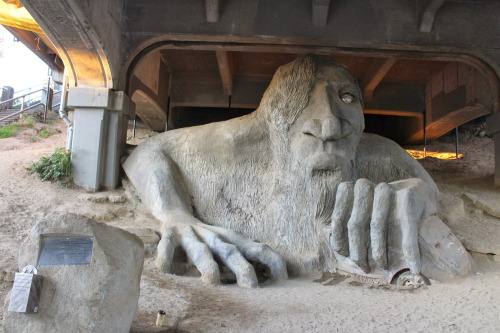 The Fremont Troll in Seattle Washington. This public art sculpture is located under the north end of the George Washington Memorial Bridge on North 36th Street at Troll Avenue.