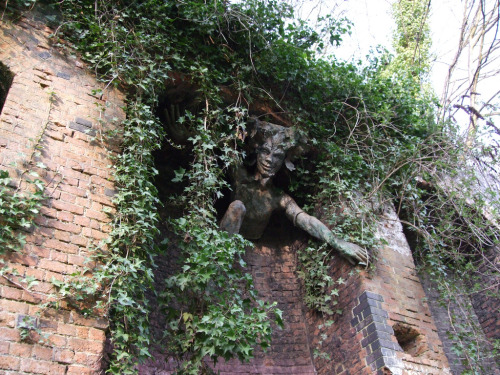 A sculpture of a spriggan in London. In Cornish folklore a spriggian is a creature who was grotesquely ugly, and were said to be found at old ruins, guarding buried treasure and generally acting as fairy bodyguards. They were also said to be busy thieves. Though usually small, they had the ability to swell to enormous size. They caused mischief to those who offended them. They sent storms to blight crops, and sometimes stole away mortal children. (Source)