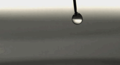 A water drop bouncing on the surface of water in slow motion(Source)