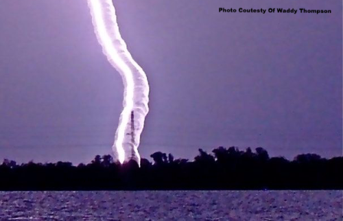 Lightning inside a waterspout.