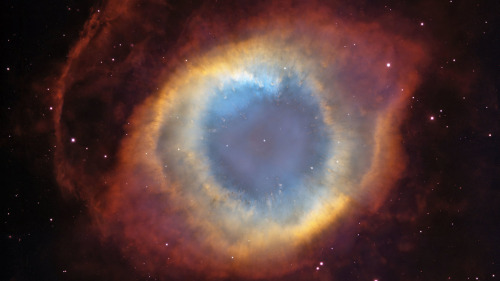 “The Eye of God,” 2003The Helix Nebula, located 690 light-years from Earth, is a ball of glowing gas expelled from a dying sun-like star. This image was a composite of a photograph taken by Hubble in 2002 and one by a telescope in Chile in 2003. CreditNASA and European Space Agency&amp; NYTIMES