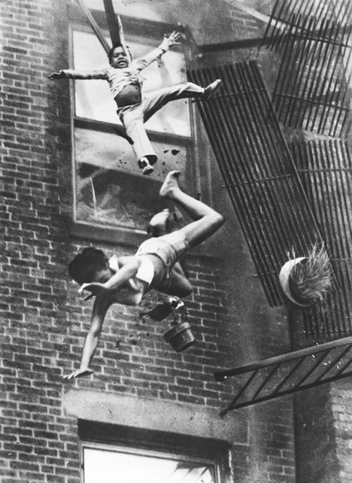 Woman and Child Fall From Broken Fire EscapeIn 1975, 19-year-old Diana Bryant and her two-year-old goddaughter Tiare Jones fell from a broken fire escape during an apartment house fire in Boston, Massachusetts. The heat had forced them into the furthest corner of the fire escape. A firefighter was on a ladder nearby and asked for Bryant to hand him the child. When she attempted to do this, the fire escape gave way. Bryant broke Jone&rsquo;s fall, saving the child, but she died later that night from her injuries. This picture prompted officials in Boston and other cities around the country to rewrite its fire escape safety laws.  The journalist who took the photo wrote, &ldquo;I was shooting pictures as they were falling - then I turned away. It dawned on me what was happening and I didn&rsquo;t want to see them hit the ground. I can still remember turning around and shaking.&rdquo; (Source)