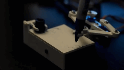 A clock that writes the time(Source)